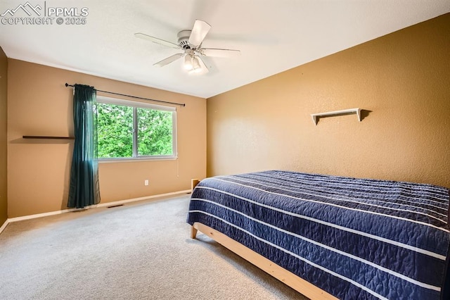 5480 Flag Way, Colorado Springs, CO 80919 - bedroom with carpet flooring and a ceiling fan