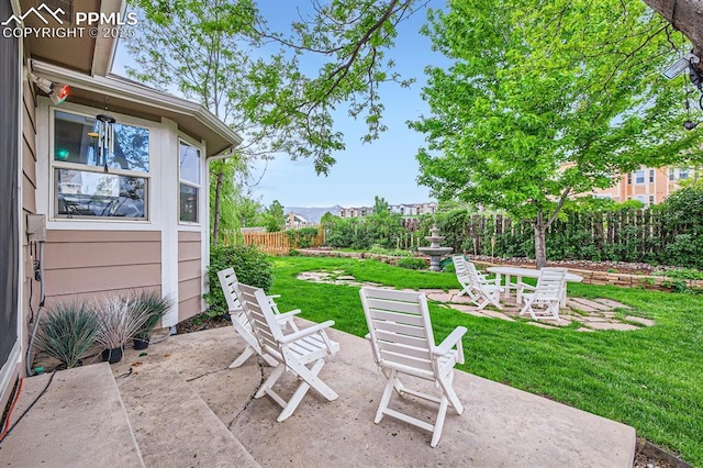 5480 Flag Way, Colorado Springs, CO 80919 - fenced backyard featuring a patio