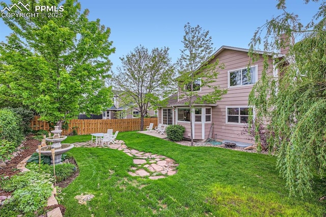 5480 Flag Way, Colorado Springs, CO 80919 - view of yard with a patio area