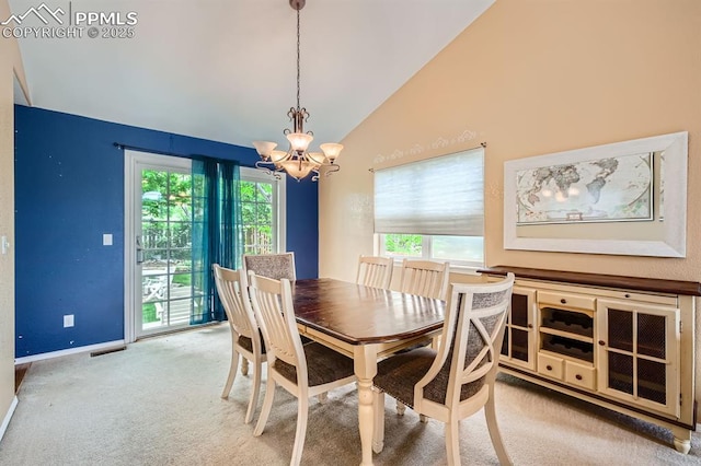 5480 Flag Way, Colorado Springs, CO 80919 - dining area with a chandelier, carpet flooring, and high vaulted ceiling