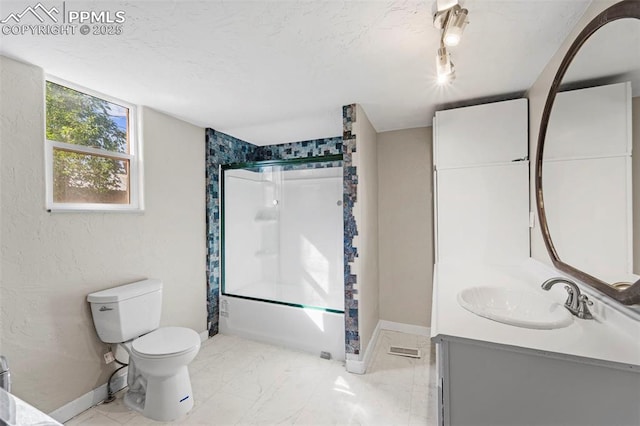 109 S 24th St, Colorado Springs, CO 80904 - bathroom with vanity, bath / shower combo with glass door, a textured ceiling, and track lighting