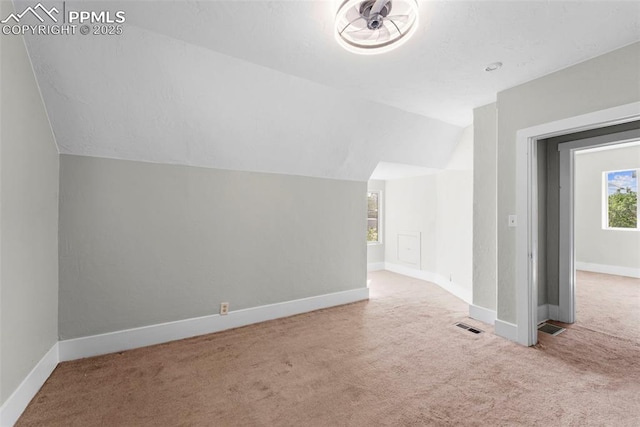 109 S 24th St, Colorado Springs, CO 80904 - additional living space featuring carpet and vaulted ceiling