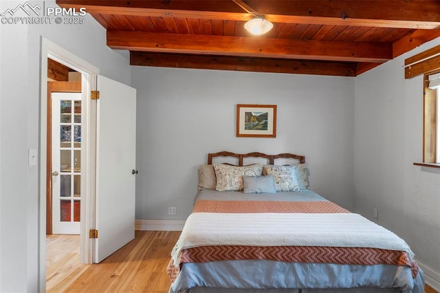 4440 Heizer St, Cascade, CO 80809 - bedroom with a wooden ceiling with exposed beams and wood finished floors