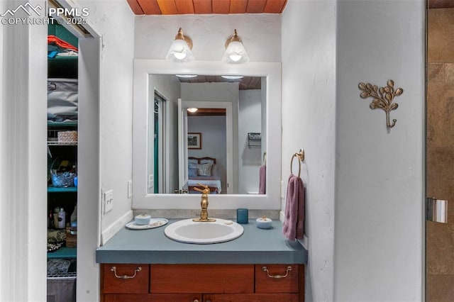 4440 Heizer St, Cascade, CO 80809 - bathroom with vanity and wood ceiling