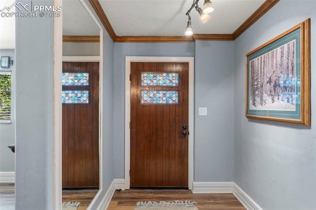 4440 Heizer St, Cascade, CO 80809 - foyer with wood finished floors and ornamental molding