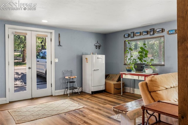 4440 Heizer St, Cascade, CO 80809 - entrance foyer with french doors, wood finished floors, and recessed lighting
