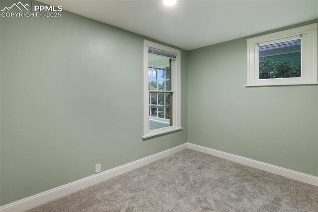 122 E Jefferson St, Colorado Springs, CO 80907 - unfurnished room with baseboards and carpet floors