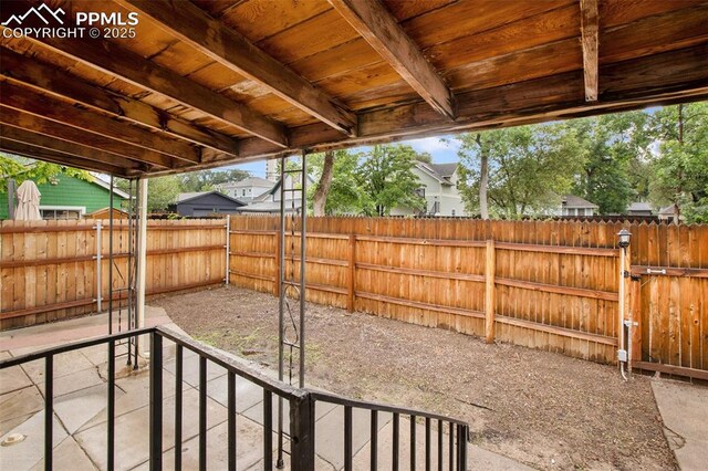 122 E Jefferson St, Colorado Springs, CO 80907 - fenced backyard featuring a gate