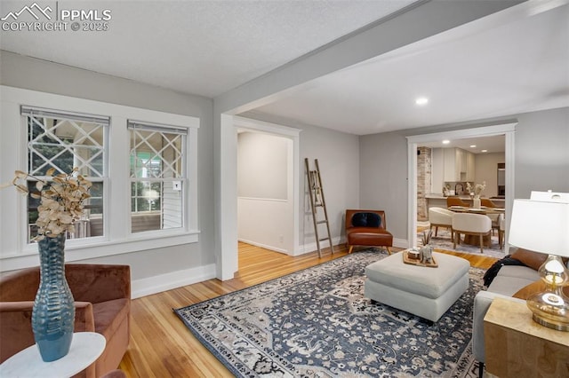 122 E Jefferson St, Colorado Springs, CO 80907 - living room featuring wood finished floors and recessed lighting