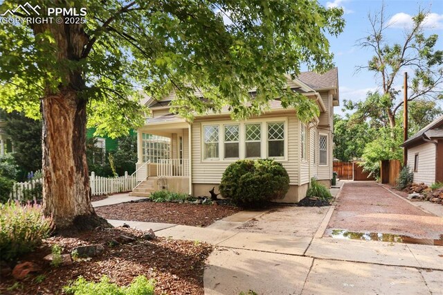 122 E Jefferson St, Colorado Springs, CO 80907 - view of front of property featuring covered porch