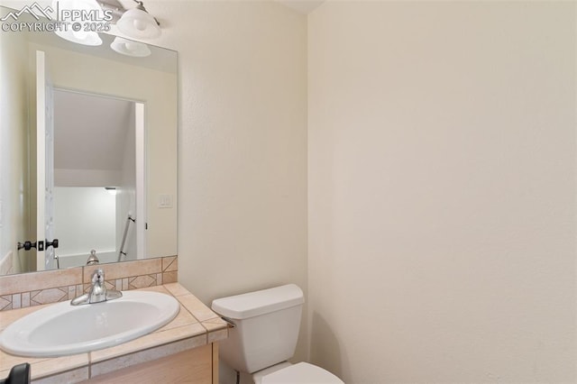 3219 W Pikes Peak Ave, Colorado Springs, CO 80904 - bathroom featuring vanity and toilet