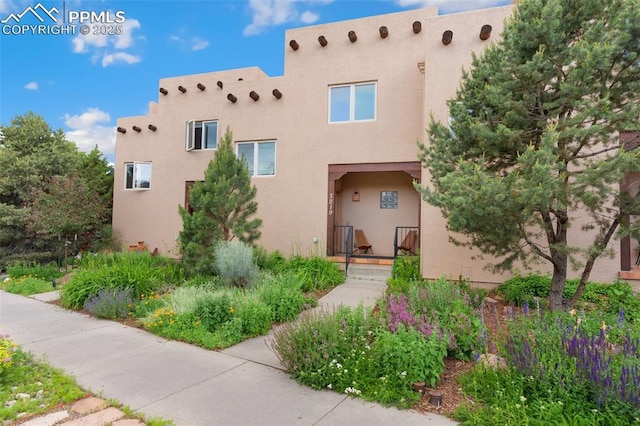 3219 W Pikes Peak Ave, Colorado Springs, CO 80904 - view of front facade featuring stucco siding