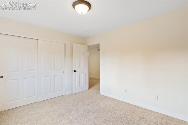 3219 W Pikes Peak Ave, Colorado Springs, CO 80904 - unfurnished bedroom featuring carpet flooring and a closet