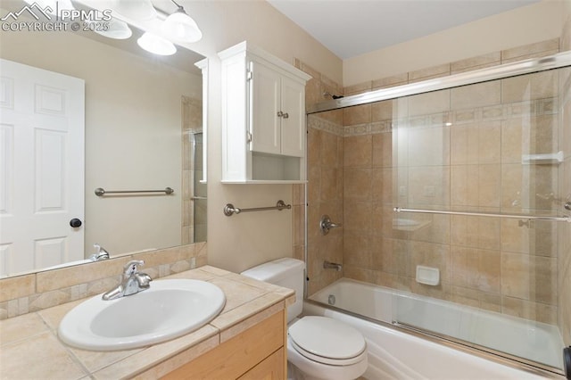 3219 W Pikes Peak Ave, Colorado Springs, CO 80904 - bathroom with vanity and combined bath / shower with glass door