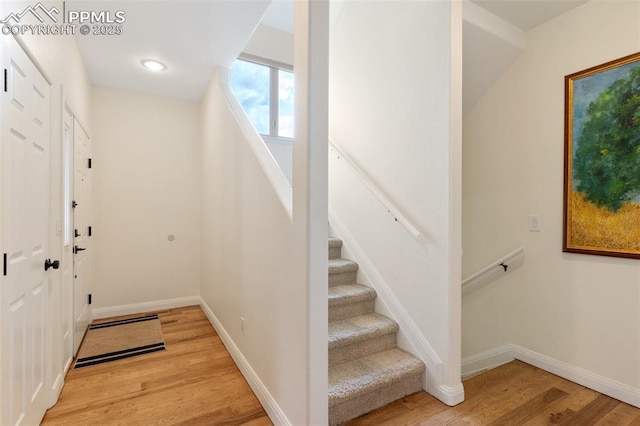 3219 W Pikes Peak Ave, Colorado Springs, CO 80904 - entrance foyer with wood finished floors and stairway