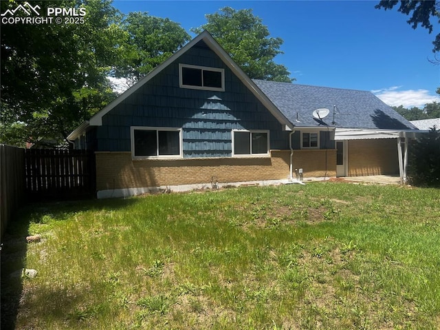 135 Judson St, Colorado Springs, CO 80911 - back of house featuring brick siding