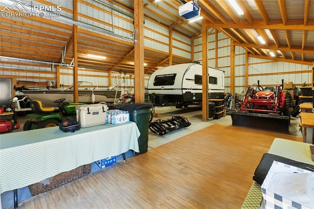 101 Daniwood Grv, Florissant, CO 80816 - garage with a garage door opener and metal wall