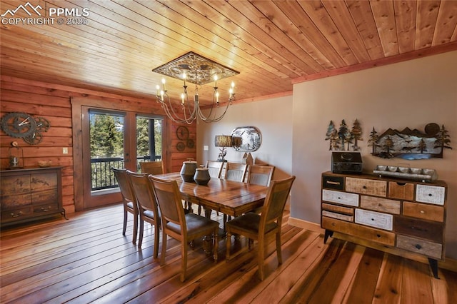101 Daniwood Grv, Florissant, CO 80816 - dining area featuring wood ceiling, a chandelier, hardwood / wood-style flooring, and ornamental molding