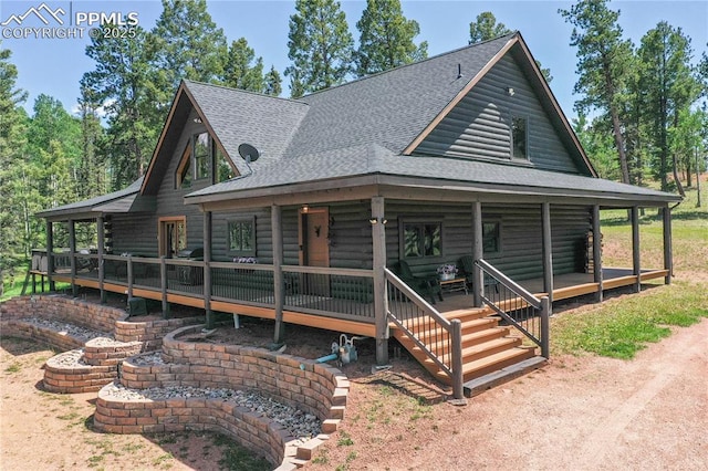 101 Daniwood Grv, Florissant, CO 80816 - log cabin with roof with shingles, a porch, and log siding