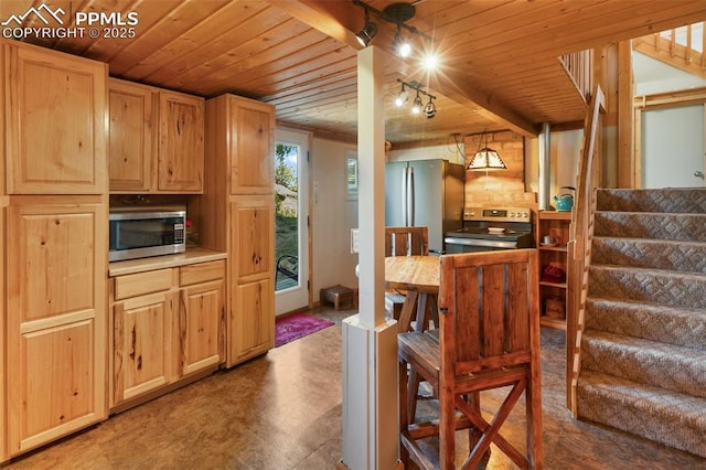 47 Red Cloud Rd, Woodland Park, CO 80863 - dining space with wooden ceiling, stairway, and track lighting