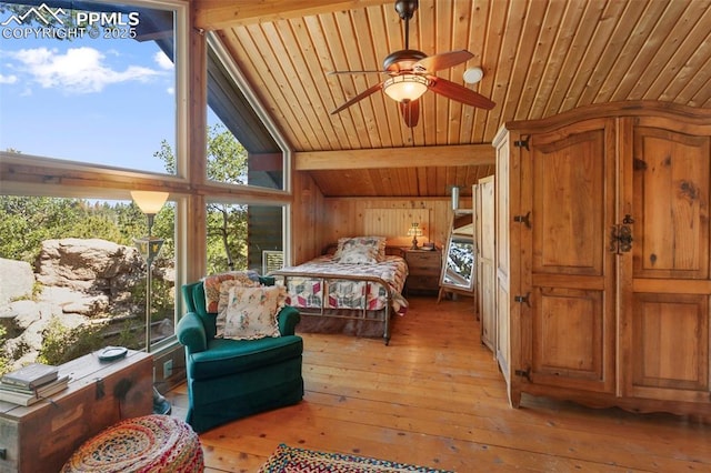 47 Red Cloud Rd, Woodland Park, CO 80863 - bedroom with wooden ceiling, light wood-style flooring, and wood walls