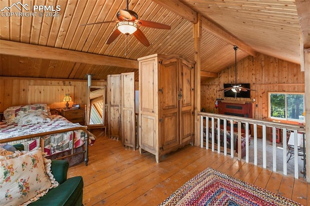 47 Red Cloud Rd, Woodland Park, CO 80863 - bedroom with wooden ceiling, light wood finished floors, and wooden walls