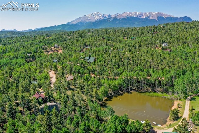 47 Red Cloud Rd, Woodland Park, CO 80863 - aerial view of a heavily wooded area and a water and mountain view