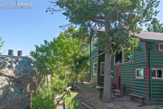 47 Red Cloud Rd, Woodland Park, CO 80863 - view of side of property with log siding
