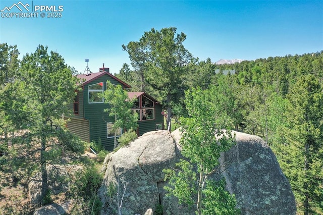 47 Red Cloud Rd, Woodland Park, CO 80863 - view of property exterior featuring a view of trees