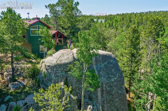 47 Red Cloud Rd, Woodland Park, CO 80863 - aerial view of property and surrounding area with a heavily wooded area