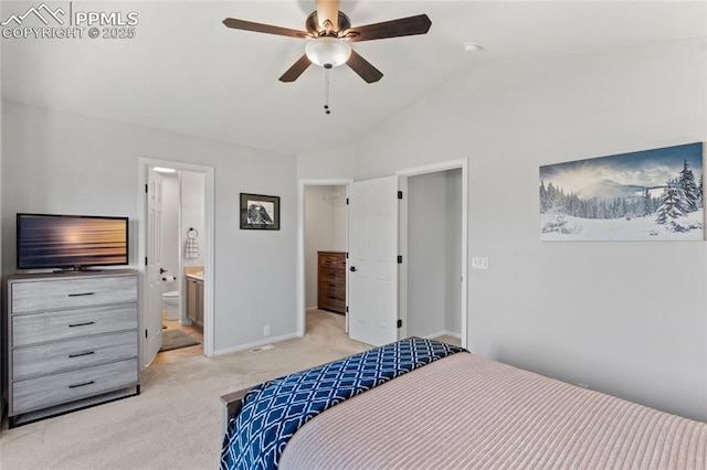 6534 Harvey Ln, Colorado Springs, CO 80923 - bedroom featuring light carpet, lofted ceiling, a spacious closet, connected bathroom, and a ceiling fan