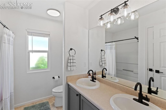 6534 Harvey Ln, Colorado Springs, CO 80923 - bathroom featuring double vanity and a shower with shower curtain