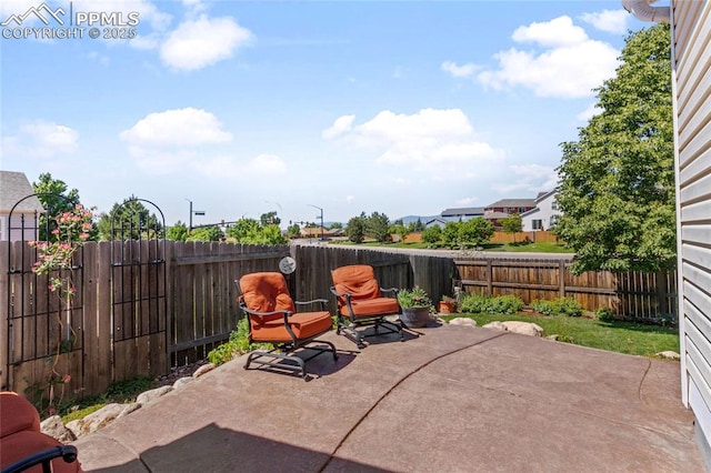 6534 Harvey Ln, Colorado Springs, CO 80923 - fenced backyard with a patio area