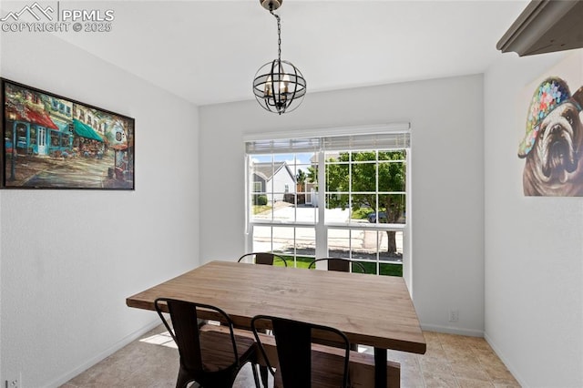 6534 Harvey Ln, Colorado Springs, CO 80923 - dining space with a chandelier and baseboards