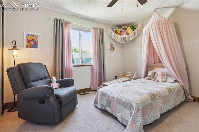 2722 Front Royal Dr, Colorado Springs, CO 80919 - carpeted bedroom featuring a textured ceiling and ceiling fan