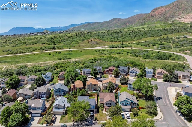 2722 Front Royal Dr, Colorado Springs, CO 80919 - aerial perspective of suburban area with a mountainous background