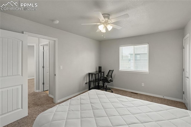 9744 Rubicon Dr, Colorado Springs, CO 80925 - carpeted bedroom featuring a ceiling fan and a textured ceiling