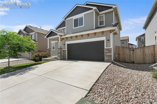 9744 Rubicon Dr, Colorado Springs, CO 80925 - craftsman inspired home featuring board and batten siding, an attached garage, stone siding, and driveway