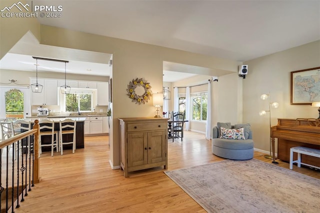 2355 Sawgrass Ct, Colorado Springs, CO 80907 - living area with light wood finished floors and plenty of natural light