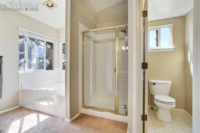 2355 Sawgrass Ct, Colorado Springs, CO 80907 - bathroom with a shower stall, a garden tub, and vaulted ceiling