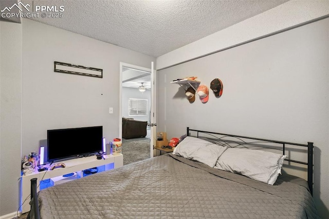 609 Wheat Field Rd, Fountain, CO 80817 - bedroom with a textured ceiling