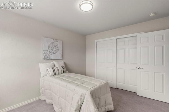 1410 Almagre Peak Dr, Colorado Springs, CO 80921 - carpeted bedroom featuring a closet and baseboards