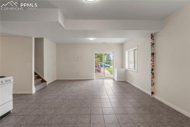 1410 Almagre Peak Dr, Colorado Springs, CO 80921 - unfurnished room featuring tile patterned floors and stairs