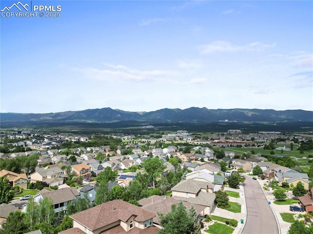 1410 Almagre Peak Dr, Colorado Springs, CO 80921 - aerial view of residential area featuring a mountainous background