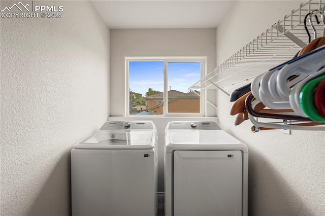 1410 Almagre Peak Dr, Colorado Springs, CO 80921 - laundry room with separate washer and dryer and a textured wall