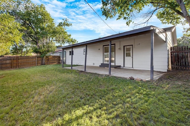 2075 Pepperwood Dr, Colorado Springs, CO 80910 - rear view of house featuring a fenced backyard and a patio area