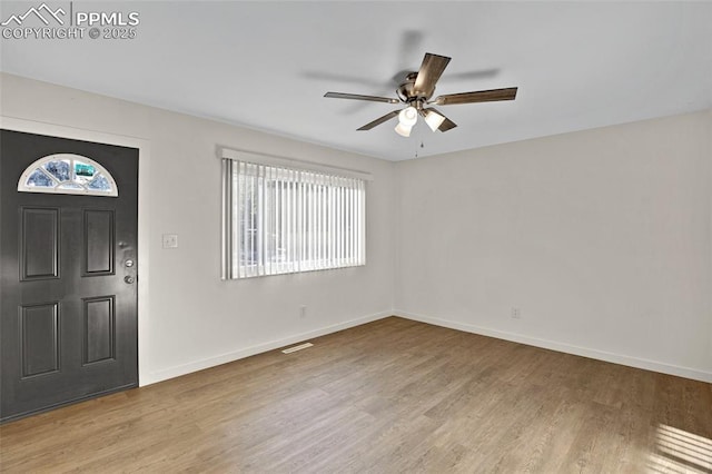 2075 Pepperwood Dr, Colorado Springs, CO 80910 - entrance foyer with a ceiling fan and wood finished floors