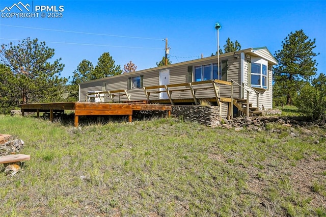 332 Valley Cir, Guffey, CO 80816 - rear view of property featuring a deck