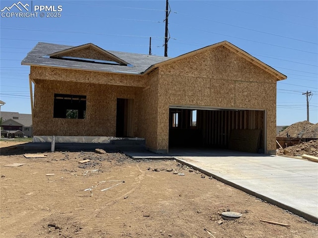 5216 Gannet Ln, Pueblo, CO 81008 - property in mid-construction featuring an attached garage and concrete driveway