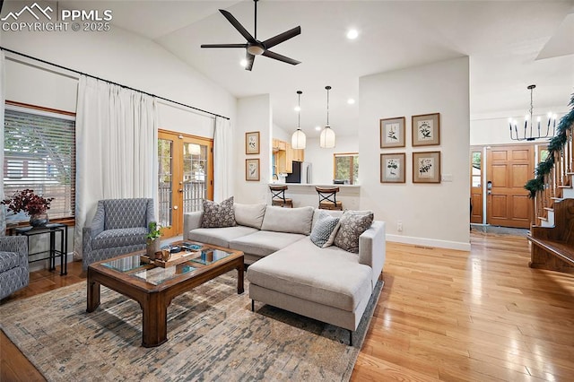 225 Laclede Ct, Colorado Springs, CO 80905 - living room with plenty of natural light, light wood finished floors, ceiling fan, high vaulted ceiling, and recessed lighting